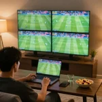 Cakhiatv user placing strategic bets while watching live football matches on multiple screens